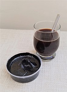 Shilajit in a glass of water.