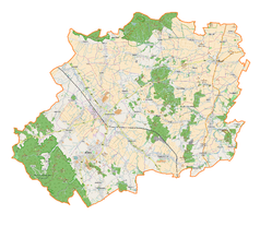 Mapa konturowa powiatu dzierżoniowskiego, blisko centrum po lewej na dole znajduje się punkt z opisem „Pałac w Bielawie”