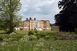 Waverley Abbey House viewed across the lake