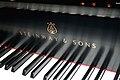 Steinway & Sons piano keys and modern logo