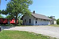 The former GTW depot at Saline, Michigan with a restored GTW wood caboose.