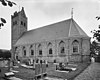 Johannes de Doperkerk (Hervormde kerk) met toren en kerkhof