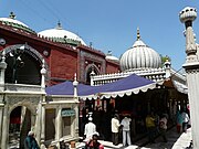 Dargahs of Sufi-saint Nizamuddin Auliya, and poet and musician Amir Khusro in Delhi.