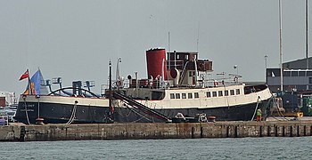 Red Funnel tug-tender Calshot under restoration in Southampton Docks