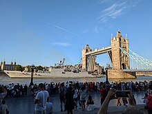 This photo portrays INS Tabar leaving London, Tower Bridge has been opened to allow the ship to pass underneath.