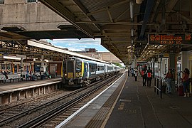 444027 calling at Woking platform 4