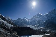 Lingtren, Khumbutse, and Everest West Shoulder overlook base camp and the Khumbu Icefall. Mount Everest South-West face (above the west shoulder) and Nuptse's side to right