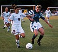 Image 28Mia Hamm (left) battles with German defender Kerstin Stegemann (from Women's association football)