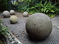 Image 28Stone spheres created by the Diquis culture at the National Museum of Costa Rica. The sphere is the icon of the country's cultural identity. (from Costa Rica)