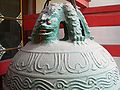 A bell in Chang Chun Temple, Wuhan, hanging on its pulao