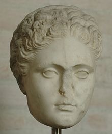 Marble head of a woman with the nose broken off