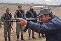 Afghan soldier aiming with an AKS-47