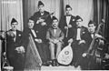 Image 3Iraqi music group led by Yusuf Za'arur in Baghdad, wearing the sidara, ca 1930. (from Music of Iraq)