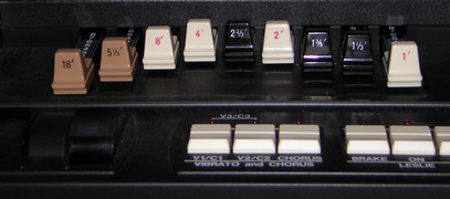 Drawbars on a Hammond organ.