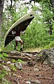 Using a yoke to carry (portage) a canoe between lakes