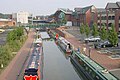 The Castle Quay Shopping, alongside the Oxford Canal and Banbury Museum in the background.