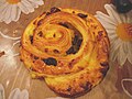 Pain aux raisins, bolo semelhante ao chineque, na França.