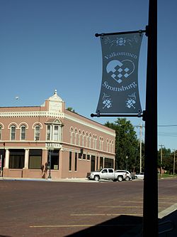 Stromsburg brick street and Valkommen sign, September 2011