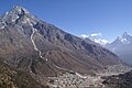 The Khumbila mountain rising above Khumjung and Kunde, two of the larger villages in the area, with Mount Everest, Lhotse and Ama Dablam in the background.