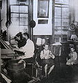 Bohemian cigarmakers at work in their tenement