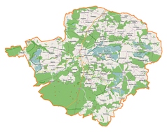 Mapa konturowa powiatu milickiego, w centrum znajduje się punkt z opisem „Duchowo”