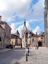 The clock tower and Saint-Lazare square in Avallon