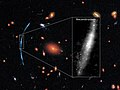 Al enfocar a un cúmulo de galaxias se ha enfocado de forma gravitatoria a una galaxia en segundo plano la cual es intervenida por el cúmulo.[15]​