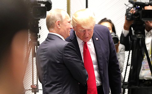 Vladimir Putin & Donald Trump (photo) at APEC Summit in Da Nang, Vietnam, 11 November.
