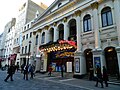 Image 34Music hall evolved into variety shows. First performed in 1912, the Royal Variety Performance was first held at the London Palladium (pictured) in 1941. Performed in front of members of the Royal Family, it is held annually in December and broadcast on television. (from Culture of the United Kingdom)