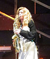 Benedicta Boccoli and her sax in Crimini del Cuore, 1 May 2015.[18]