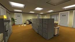 A brightly lit office space with tarnish-brown flooring, egg-white walls, and square overhead lights. Several closed doors leading to personal offices and other rooms line the walls, as well as plants and other office-related objects. In the center of the room is a large filing cabinet.