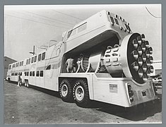 Nuclear-powered bendy bus with 75 tons on 32 enormous wheels providing a bowling alley and a pool (prop for the 1976 film The Big Bus)