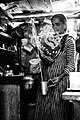 South Indian lady, preparing a cup of morning tea in the traditional South Indian way.