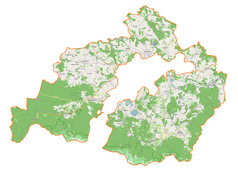 Mapa konturowa powiatu karkonoskiego, na dole nieco na prawo znajduje się punkt z opisem „Karpacz”