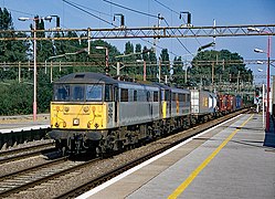 2 BR class 86/6s on container train at Northampton, 1996