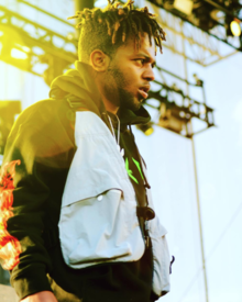 MadeinTYO performing in 2018