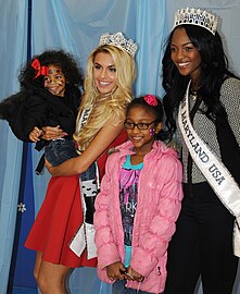 Taylor Dawson, Miss Maryland Teen USA 2015 and Mamé Adjei, Miss Maryland USA 2015 at an event for military families