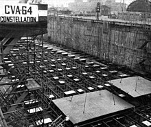 The keel-laying of the USS Constellation (CVA-64) at New York Naval Shipyard in 1957