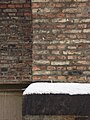 Trinitatis Kirke, København. Facade fra renæssancen af gule og indfarvede røde mopper.