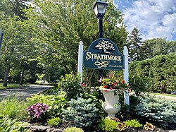 The sign at the entrance to the Strathmore Village portion of the hamlet on June 15, 2021.