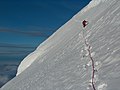 Traversing the west slope of Lyaskovets Peak back to Catalunyan Saddle during the first ascent of the peak