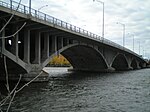 A concrete arch bridge.