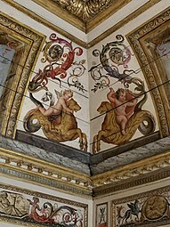 Baroque putti painted on the boiserie of a room from the Hôtel Colbert de Villacerf, now in the Musée Carnavalet, Paris, unknown architect, sculptor and painter, c. 1650[10]