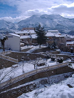 The view of the snowy town of Benimasot