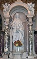 One of five saints altars lining the wall behind the Main Altar.