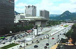 The square in 2011. The Statue of Admiral Yi Sun-sin is in the center, and to the far right is Gyeongbokgung and the Blue House just above it