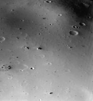 The surface of Deimos, a moon of Mars, is covered by a layer of regolith estimated to be 50 m (160 ft) thick. Viking 2 orbiter image is from a height of 30 km (19 mi).