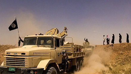 Боевики террористической группировки Исламское государство на границе Сирии и Ирака. Архивное фото Боевики террористической группировки Исламское государство на границе Сирии и Ирака. Архивное фото