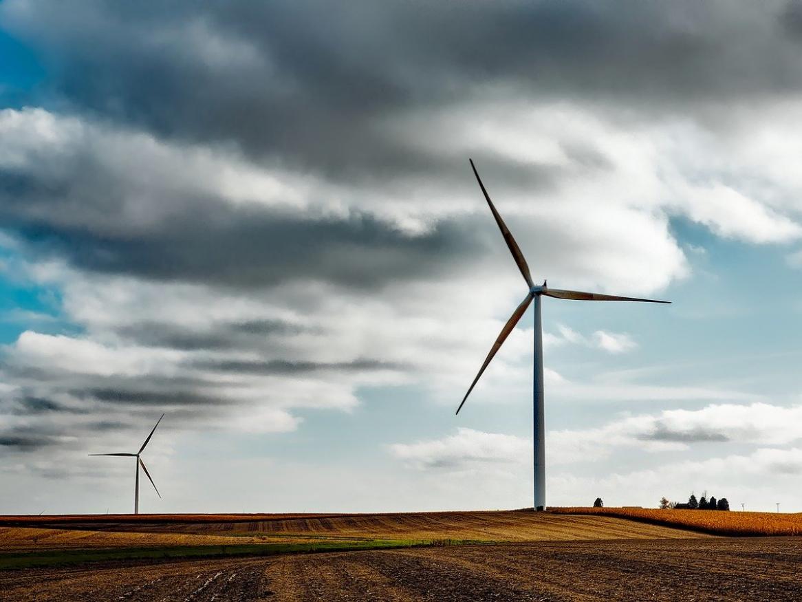 Wind turbines with a cloudy sky