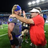 Georgia head coach Kirby Smart and Kentucky quarterback Brock Vandagriff (12) greet each other after Georgia beat Kentucky during an NCAA football game at Kroger Field, Saturday, September 14, 2024,  in Lexington, Kentucky. Georgia won 13-12 over Kentucky. Vandagriff is a former Georgia player. (Hyosub Shin / AJC)